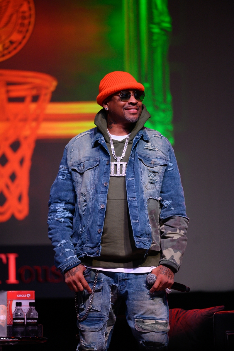 Allen Iverson smiles onstage during his book tour appearance at the Buckhead Theatre in Atlanta.