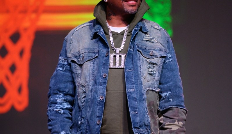 Allen Iverson smiles onstage during his book tour appearance at the Buckhead Theatre in Atlanta.