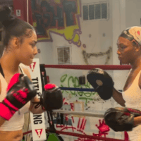 Claressa Shields trains Big Lex during a boxing session ahead of Big Lex's upcoming fight against Tesehki on the Claressa Shields vs. Kaye Scott undercard.