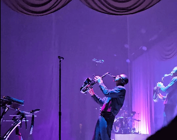 Masego plays saxophone onstage during the Fix Your Face Tour at Nashville’s Ryman Auditorium.