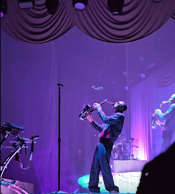 Masego plays saxophone onstage during the Fix Your Face Tour at Nashville’s Ryman Auditorium.